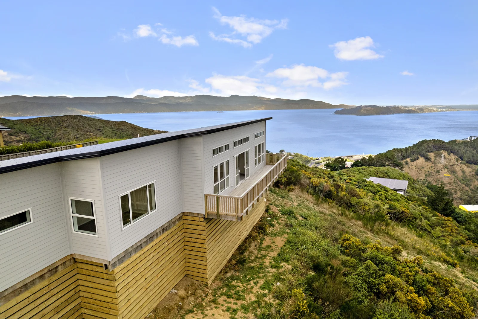 Completed home above Wellington Harbour